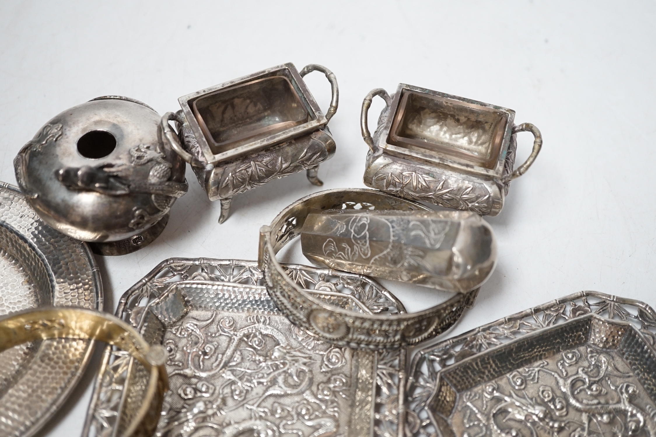 Chinese white metal items including small dishes, pair of salts, box and cover, two bangles etc.